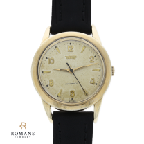 Tissot Watch 10K Yellow Gold Bezel